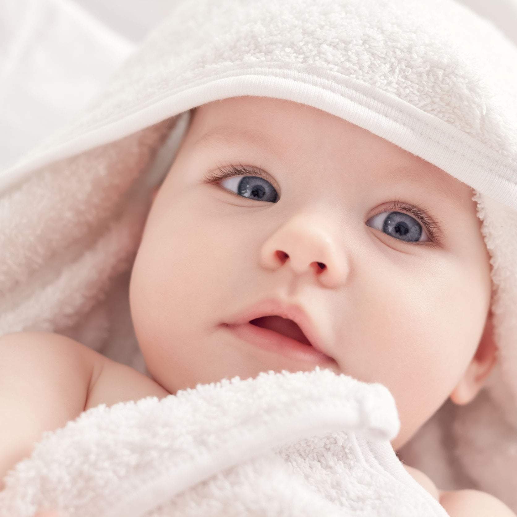 baby-with-eczema-in-bath-towel