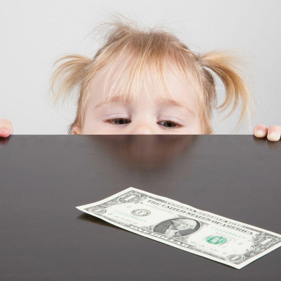 toddler and dollar bill